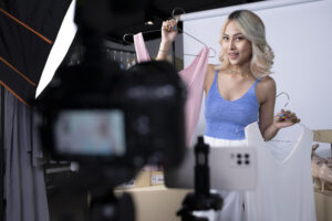 Woman influencer shows off clothes part of brand deal
